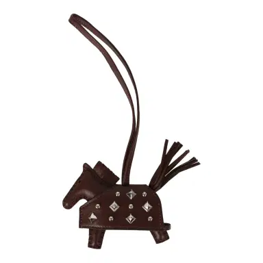 HERMÈS Hermes Rodeo Rock Bag Charm PM Terre Milo Lambskin Palladium Hardware | Thumbnail 1 HERMÈS Hermes Rodeo Rock Bag Charm PM Terre Milo Lambskin Palladium Hardware | Thumbnail 1