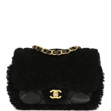 Chanel Chanel Mini Shearling Flap Bag Black Lambskin Brushed Gold Hardware | Thumbnail 1 Chanel Chanel Mini Shearling Flap Bag Black Lambskin Brushed Gold Hardware | Thumbnail 1