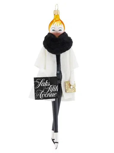 De Carlini Lady With Cape & Saks Bag Ornament | Thumbnail 1 De Carlini Lady With Cape & Saks Bag Ornament | Thumbnail 1