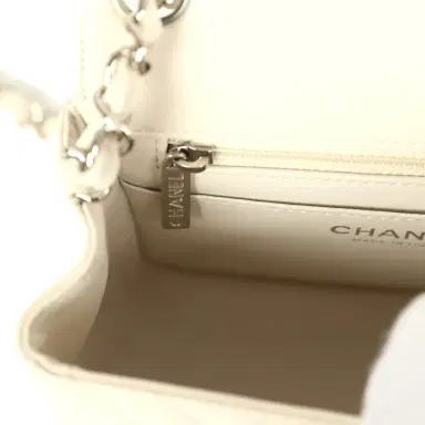 Chanel Pre-owned Chanel Mini Chevron Square Flap Bag Ivory Lambskin Silver Hardware | Thumbnail 10 Chanel Pre-owned Chanel Mini Chevron Square Flap Bag Ivory Lambskin Silver Hardware | Thumbnail 10