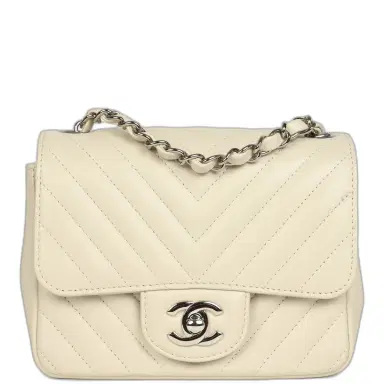 Chanel Pre-owned Chanel Mini Chevron Square Flap Bag Ivory Lambskin Silver Hardware | Thumbnail 1 Chanel Pre-owned Chanel Mini Chevron Square Flap Bag Ivory Lambskin Silver Hardware | Thumbnail 1
