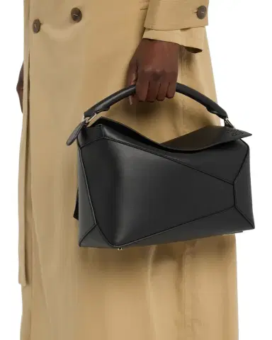 Loewe Puzzle Edge Medium Top-Handle Bag in Grained Leather | Thumbnail 1 Loewe Puzzle Edge Medium Top-Handle Bag in Grained Leather | Thumbnail 1