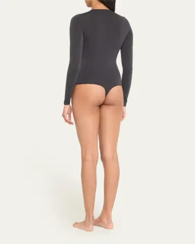 Skims Essential Smoothing Long-Sleeve Thong Bodysuit | Thumbnail 3