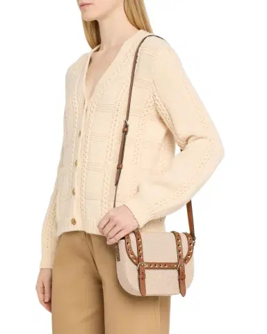 Valentino Garavani Rockstud Small Canvas Saddle Crossbody Bag | Thumbnail 1