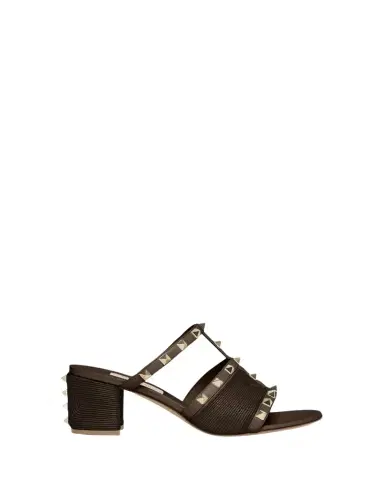 Valentino Garavani Rockstud Raffia Block-Heel Slide Sandals | Thumbnail 1 Valentino Garavani Rockstud Raffia Block-Heel Slide Sandals | Thumbnail 1