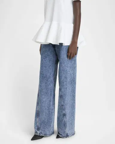 ALAÏA Twisted-Hem Wide-Leg Acid Denim Jeans | Thumbnail 2 ALAÏA Twisted-Hem Wide-Leg Acid Denim Jeans | Thumbnail 2