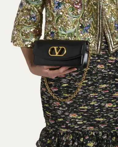 Valentino Garavani Vain Small VLOGO Leather Clutch Bag | Thumbnail 2 Valentino Garavani Vain Small VLOGO Leather Clutch Bag | Thumbnail 2