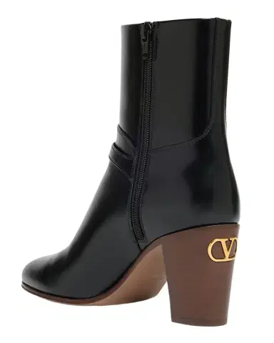 Valentino Garavani Pattie Leather Buckle Ankle Boots | Thumbnail 1 Valentino Garavani Pattie Leather Buckle Ankle Boots | Thumbnail 1