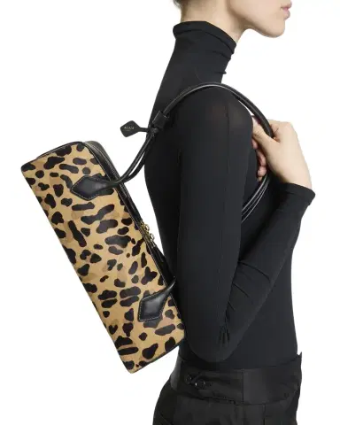 Alaïa Le Teckel Medium Shoulder Bag in Leopard Calf Hair | Thumbnail 1 Alaïa Le Teckel Medium Shoulder Bag in Leopard Calf Hair | Thumbnail 1