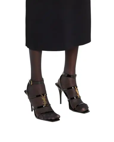 Saint Laurent Cassandra YSL Medallion Leather Stiletto Sandals | Thumbnail 1 Saint Laurent Cassandra YSL Medallion Leather Stiletto Sandals | Thumbnail 1