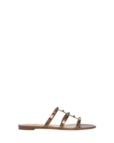 Valentino Garavani Rockstud Metallic City Flat Slide Sandals | Thumbnail 1 Valentino Garavani Rockstud Metallic City Flat Slide Sandals | Thumbnail 1