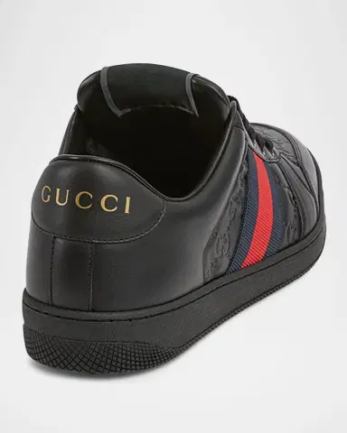 Gucci Men's GG Embossed Leather Low-Top Sneakers | Thumbnail 3 Gucci Men's GG Embossed Leather Low-Top Sneakers | Thumbnail 3