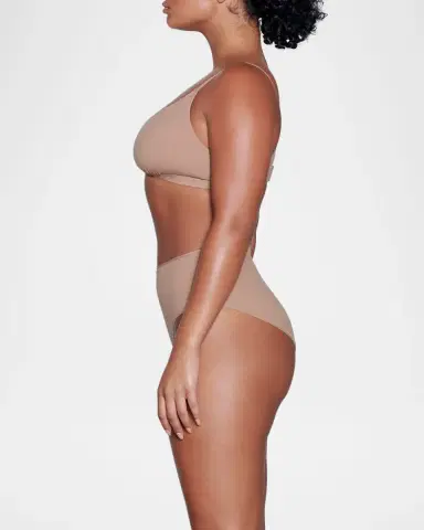 Skims Fits Everybody Crossover Bralette | Thumbnail 3 Skims Fits Everybody Crossover Bralette | Thumbnail 3