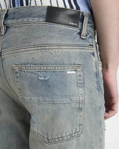 AMIRI Men's MX1 Distressed Jeans with Pleated Suede | Thumbnail 5