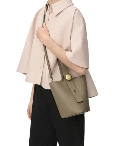 Loewe Pebble Mini Bucket Bag in Grain Leather | Thumbnail 1 Loewe Pebble Mini Bucket Bag in Grain Leather | Thumbnail 1