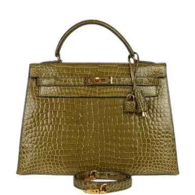HERMÈS Vintage Hermes Kelly Sellier 32 Vert Anis Shiny Porosus Crocodile Gold Hardware | Thumbnail 1 HERMÈS Vintage Hermes Kelly Sellier 32 Vert Anis Shiny Porosus Crocodile Gold Hardware | Thumbnail 1
