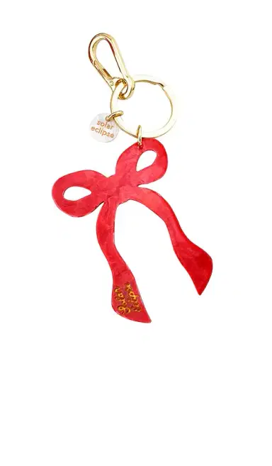 Solar Eclipse Hand-Painted Coquette Bow Bag Charm + Keychain | Thumbnail 1