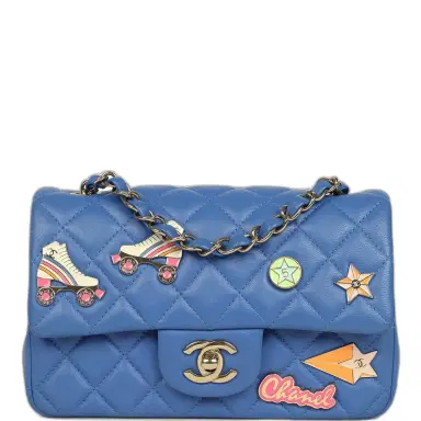 Chanel Preowned Chanel Mini Rectangular Hollywood Charms Flap Bag Blue Lambskin Light Gold Hardware | Thumbnail 1 Chanel Preowned Chanel Mini Rectangular Hollywood Charms Flap Bag Blue Lambskin Light Gold Hardware | Thumbnail 1