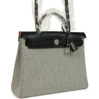 HERMÈS Hermes Herbag Zip PM 31 Black Vache Hunter and Ecru-Black Criss Viking Canvas Palladium Hardware | Thumbnail 2 HERMÈS Hermes Herbag Zip PM 31 Black Vache Hunter and Ecru-Black Criss Viking Canvas Palladium Hardware | Thumbnail 2