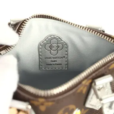 Louis Vuitton Louis Vuitton "57th Street NYC" Vivienne Nano Speedy Bag Brown Monogram Snowy Pearl Gold Hardware | Thumbnail 8 Louis Vuitton Louis Vuitton "57th Street NYC" Vivienne Nano Speedy Bag Brown Monogram Snowy Pearl Gold Hardware | Thumbnail 8