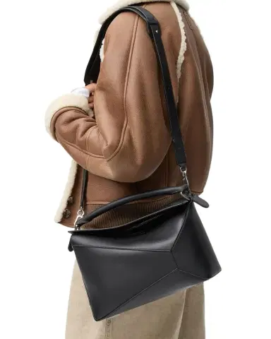 Loewe Puzzle Edge Medium Top-Handle Bag in Leather | Thumbnail 1 Loewe Puzzle Edge Medium Top-Handle Bag in Leather | Thumbnail 1
