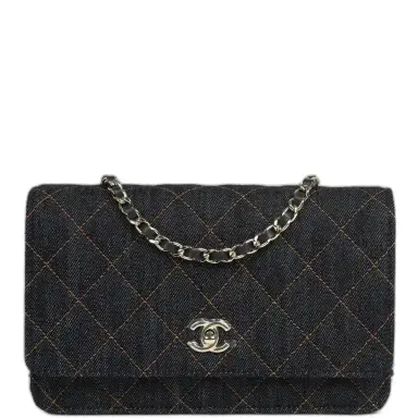 Chanel Chanel Wallet On Chain WOC Dark Blue Denim Light Gold Hardware | Thumbnail 1 Chanel Chanel Wallet On Chain WOC Dark Blue Denim Light Gold Hardware | Thumbnail 1