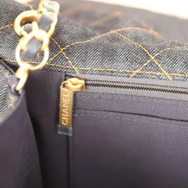 Chanel Chanel XXL Classic Single Travel Flap Bag Dark Blue Denim Brushed Gold Hardware | Thumbnail 10 Chanel Chanel XXL Classic Single Travel Flap Bag Dark Blue Denim Brushed Gold Hardware | Thumbnail 10