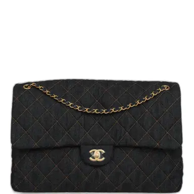 Chanel Chanel XXL Classic Single Travel Flap Bag Dark Blue Denim Brushed Gold Hardware | Thumbnail 1 Chanel Chanel XXL Classic Single Travel Flap Bag Dark Blue Denim Brushed Gold Hardware | Thumbnail 1