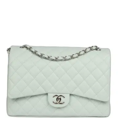 Chanel Chanel Maxi Classic Double Flap Bag Light Blue Shiny Caviar Silver Hardware | Thumbnail 1 Chanel Chanel Maxi Classic Double Flap Bag Light Blue Shiny Caviar Silver Hardware | Thumbnail 1