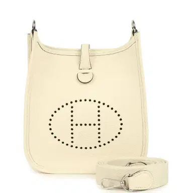 HERMÈS Hermes Evelyne TPM Cream Clemence Palladium Hardware | Thumbnail 1 HERMÈS Hermes Evelyne TPM Cream Clemence Palladium Hardware | Thumbnail 1