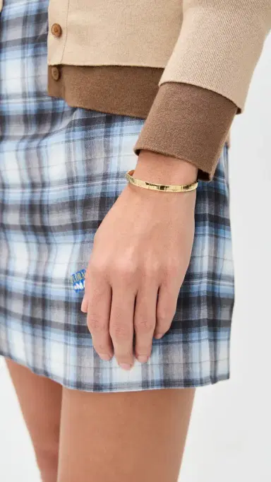 SHASHI Striated Bangle Bracelet Gold One Size | Thumbnail 3