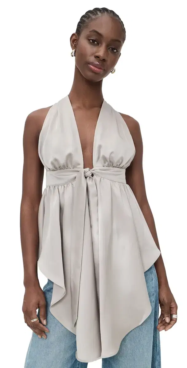 atin Peplum High Low Top andstone