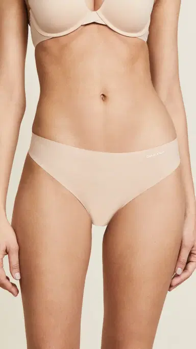 Calvin Klein Underwear Invisibles Thongs 3 Pack Light Caramel | Thumbnail 3