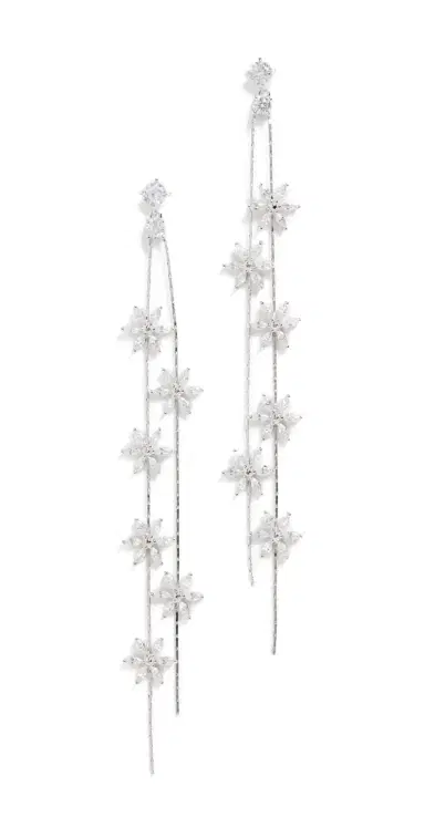 Shashi Whisper Earrings White Gold | Thumbnail 1 Shashi Whisper Earrings White Gold | Thumbnail 1