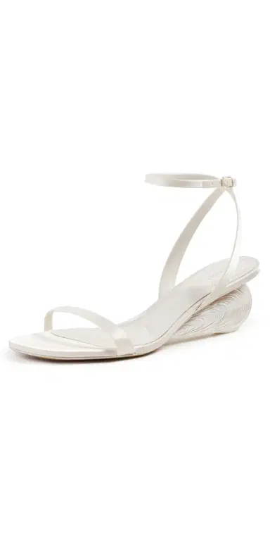 SIMKHAI Bridget Satin Oyster Shell Wedge Sandals Alabaster | Thumbnail 1 SIMKHAI Bridget Satin Oyster Shell Wedge Sandals Alabaster | Thumbnail 1