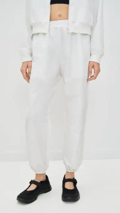 Eugenia Kim LOVE Martina Optic White Tennis Warm-Up Pants With Ankle Side Zippers | Thumbnail 2 Eugenia Kim LOVE Martina Optic White Tennis Warm-Up Pants With Ankle Side Zippers | Thumbnail 2