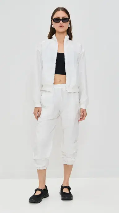 Eugenia Kim LOVE Martina Optic White Tennis Warm-Up Pants With Ankle Side Zippers | Thumbnail 5 Eugenia Kim LOVE Martina Optic White Tennis Warm-Up Pants With Ankle Side Zippers | Thumbnail 5
