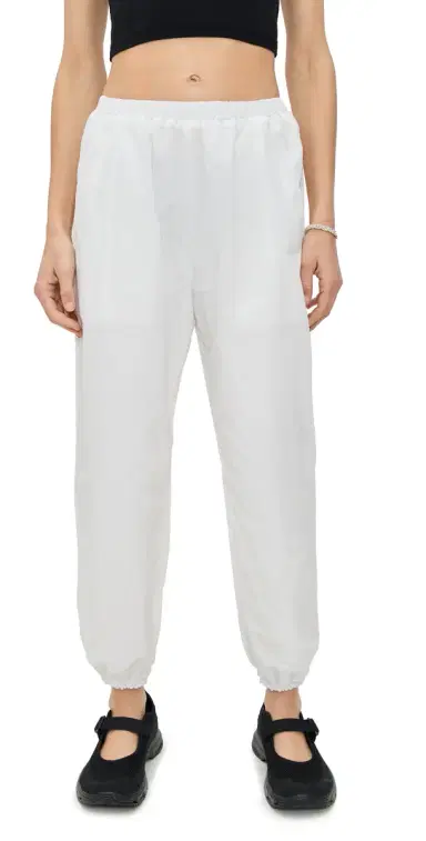 Eugenia Kim LOVE Martina Optic White Tennis Warm-Up Pants With Ankle Side Zippers | Thumbnail 1 Eugenia Kim LOVE Martina Optic White Tennis Warm-Up Pants With Ankle Side Zippers | Thumbnail 1