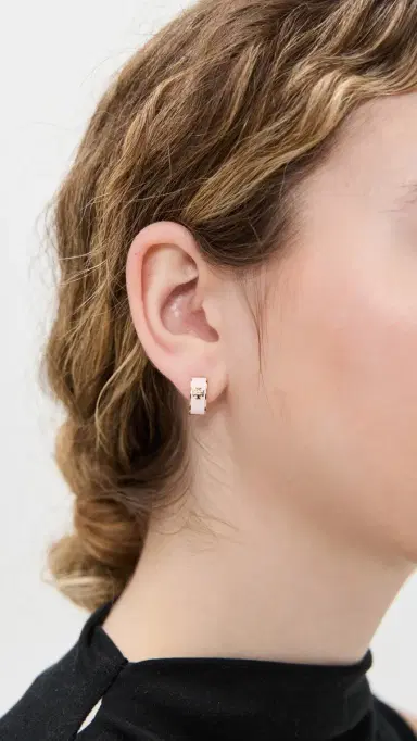 Tory Burch Wide Icon Enamel Huggie Earrings Tory Gold/Pink Snow One Size | Thumbnail 3 Tory Burch Wide Icon Enamel Huggie Earrings Tory Gold/Pink Snow One Size | Thumbnail 3