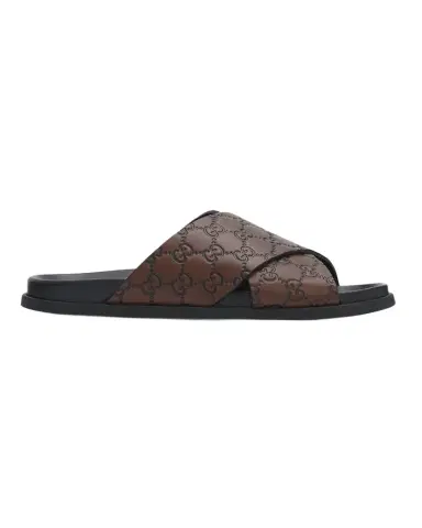 Gucci Men 's GG-Embossed Leather Slides | Thumbnail 1 Gucci Men 's GG-Embossed Leather Slides | Thumbnail 1