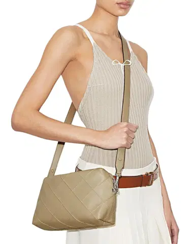 Tory Burch Fleming Large Quilted Leather Soft Pouch Bag | Thumbnail 1 Tory Burch Fleming Large Quilted Leather Soft Pouch Bag | Thumbnail 1