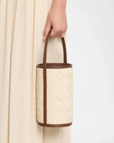 POOLSIDE The Cylinder Woven Straw Bucket Bag | Thumbnail 2 POOLSIDE The Cylinder Woven Straw Bucket Bag | Thumbnail 2
