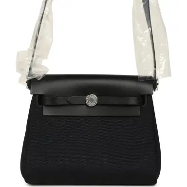 HERMÈS Hermes Herbag Zip 20 Mini Black Toile Militaire Canvas and Vache Hunter Palladium Hardware | Thumbnail 1 HERMÈS Hermes Herbag Zip 20 Mini Black Toile Militaire Canvas and Vache Hunter Palladium Hardware | Thumbnail 1