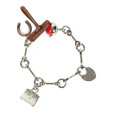 HERMÈS Hermes Bijou De Sac Charm Fauve Barenia Palladium Hardware | Thumbnail 1 HERMÈS Hermes Bijou De Sac Charm Fauve Barenia Palladium Hardware | Thumbnail 1