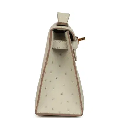 HERMÈS Hermes Kelly Pochette Gris Perle Ostrich Gold Hardware | Thumbnail 3 HERMÈS Hermes Kelly Pochette Gris Perle Ostrich Gold Hardware | Thumbnail 3