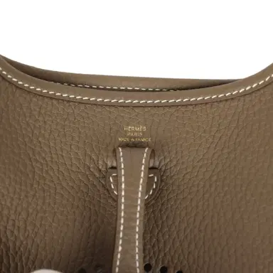 HERMÈS Hermes Evelyne TPM Etoupe Clemence Gold Hardware | Thumbnail 7 HERMÈS Hermes Evelyne TPM Etoupe Clemence Gold Hardware | Thumbnail 7