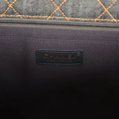 Chanel Chanel XXL Classic Single Travel Flap Bag Dark Blue Denim Brushed Gold Hardware | Thumbnail 9 Chanel Chanel XXL Classic Single Travel Flap Bag Dark Blue Denim Brushed Gold Hardware | Thumbnail 9