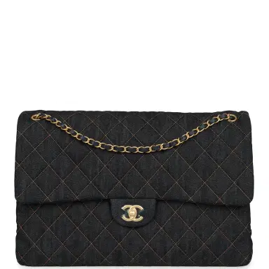 Chanel Chanel XXL Classic Single Travel Flap Bag Dark Blue Denim Brushed Gold Hardware | Thumbnail 1 Chanel Chanel XXL Classic Single Travel Flap Bag Dark Blue Denim Brushed Gold Hardware | Thumbnail 1