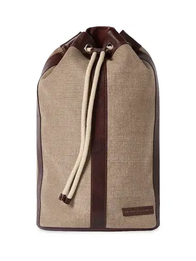 Brunello Cucinelli Women's Water Resistant Canvas and Burnished Calfskin Drawstring Backpack | Thumbnail 1 Brunello Cucinelli Women's Water Resistant Canvas and Burnished Calfskin Drawstring Backpack | Thumbnail 1