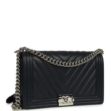 Chanel Pre-owned Chanel New Medium Chevron Boy Bag Navy Blue Calfskin Silver Hardware | Thumbnail 2 Chanel Pre-owned Chanel New Medium Chevron Boy Bag Navy Blue Calfskin Silver Hardware | Thumbnail 2